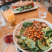 Soba noodles bowl with homemade kimchi and huge avocado sandwich   at Veganika in Ljubljana