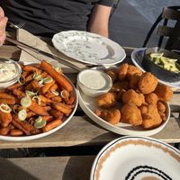 sweet potato fries (zlatka), fried cauliflower (karfjola), olives oil  at Veganika in Ljubljana