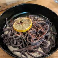 Blueberry noodles with lemon pepper sauce at Veganika in Ljubljana