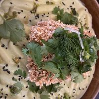 Fried tofu with rice cakes in green curry sauce  at Veganika in Ljubljana