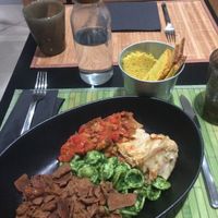 corn bread, lasagna, spicy pesto pasta, seitan and veggies and tofu stripes at Demetra in Milan