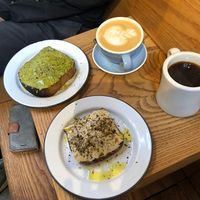 Avocado toast, GF hummus + zaatar toast, oat milk latte and drip coffee  at The Mill by Josey Baker Bread in San Francisco
