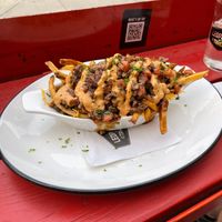Vegan smash burger poutine — better than expected !  at Leopold's Tavern in Calgary