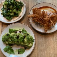 Silesian potato dumplings, garlic spring greens and labneh, salt and chilli enoki mushrooms.  at Stereo in Glasgow