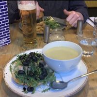 Pesto sandwich and soup and seitan burger in the background  at Stereo in Glasgow