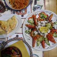Large Greek salad, tomato pasta and eggplant parmigiana at Frankie's in Sorrento