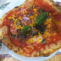 Vegan pizza with basil, onion, mushrooms and spicy corn at Frankie's in Sorrento