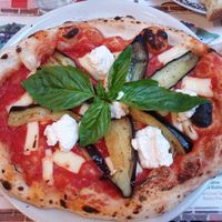 Sicily pizza with aubergine and vegan cheese at Frankie's in Sorrento
