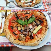 Pizza with vegan cheese, courgette, aubergine and mushrooms at Frankie's in Sorrento