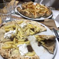 My pizza was the one in the front (the other one isn’t vegan) and it was made by: beyond meat sausage, violife cheese, vegan stracciatella and fries. Delicious . at Frankie's in Sorrento