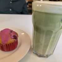 Raspberry muffin and iced matcha latte at Flow Specialty Coffee Bar & Bistro in Budapest