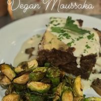 Vegan moussaka and maple glazed Brussels sprouts  at One Grub Community in El Paso