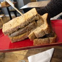 Sausage and bacon sandwich  at One Kitchen & Social in Newcastle Upon Tyne