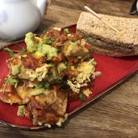 Half the hash bowl (for size) with half the sandwich   at One Kitchen & Social in Newcastle Upon Tyne
