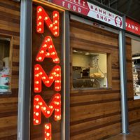 Window to the kitchen. Say hi to the sweet woman doing the cooking!  at Dallas Farmers Market in Dallas