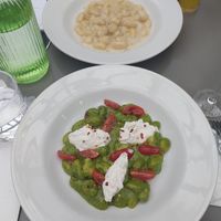 delicious and fulfilling gnocchi, two different types. the green ones include pesto, burrella and cherry tomatoes, and the taste is really multilayered. the white ones are creamy a at Plant Club in North London
