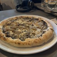 Mushroom truffle vegan pizza  at Plant Club in North London