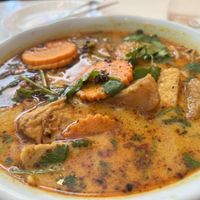 Noodles in a coconut broth - super delicious   at Golden Lotus Vegan Restaurant in Oakland
