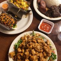 Tacos, mofongo topped with chicharron, jackfruit oxtail plate at Juuuicy's Vegan Restaurant & Mama's Vegan Cocina in West Palm Beach