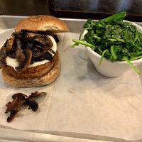 Beyond Burger with Daiya Swiss and truffle mushrooms with a side of garlic spinach.  at Brooklyn Burgers & Beer in Brooklyn