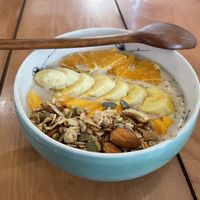 Overnight oat meat vegan bowl with granola topping added as an extra  at Hanoi Coffee Station in Hanoi