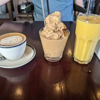 Soy flat white, 50k. PB iced coffee 55k, mango smoothie 50k at Hanoi Coffee Station in Hanoi