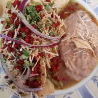 Chilaquiles verdes con nopales y chorizo de soya at Panza Llena Corazón Contento in San Jose Del Cabo