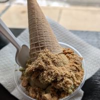 Pistachio ice cream with graham cracker topping and a sugar cone hat :) at Sugar Spell Scoops in Sharpsburg