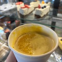 Turmeric latte and vegan pastries in the background.  at VegB12 in Tallinn