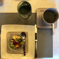 Kick starting my day with fruit salad, green juice with spirulina and decaf coffee :) at Lut's B&B in South Hykeham