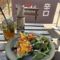 Beautifully presented smashed avocado on charcoal bread.   at Plantarium Cafe in Stratford-upon-avon