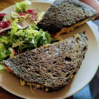 Toasties, made with charcoal bread 😊 at Plantarium Cafe in Stratford-upon-avon