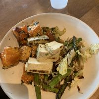 Tofu entree with asparagus and sweet potato  at Flower Child in Addison