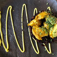 'Huera' curry with black rice, mushroom, and peanuts at Avocado Love in Madrid