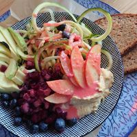 Salad bowl with humus, courgette, beet root, avocado and berrys at Wilma Wunder in Dusseldorf