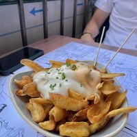 Patatas bravas  at Tintoreria Hamburgueseria in Ribes De Freser