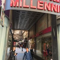 The sign you should look for is red, on the right side of Kneza Mihaila Street as you are headed to Republic Square. As of April '19 it was next to a ladies clothing store. at Veganski Kiosk in Belgrade