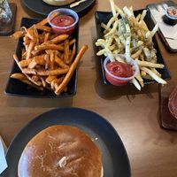 Y’all these fries are amazing!   Sweet potato and garlic Parmesan.     at Wisdom's Vegan Bakery & Cafe in Spring