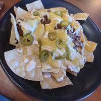 Vegan chorizo and black bean nachos at Wisdom's Vegan Bakery & Cafe in Spring