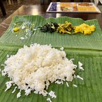 Banana leaf meal (containers of extra curry and poppadoms also)   at Sri Kaveri in Malacca