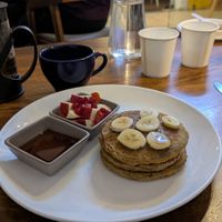 Vegan pancakes (green tea in the background) at Step Out Cafe in Jaipur