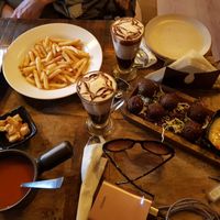 amazing tomato soup, fries, 2 vegan hot chocolates and falafel balls at Step Out Cafe in Jaipur