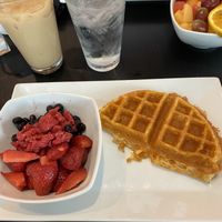 Vegan waffles & fruit and an iced vanilla soy latte 🤤 at Waffles INCaffeinated - Fifth Ave in Pittsburgh