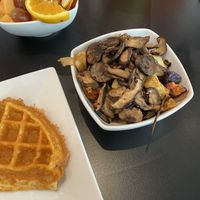 Home fries (tri-colored potatoes) with onions, peppers, and added mushrooms 😊 at Waffles INCaffeinated - Fifth Ave in Pittsburgh