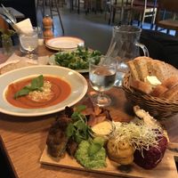 From the left: soup of the day, vinagrette salad side dish, the tasting board with plantedeller, remoulade, herb creme, tarragon mayo, hummus with lemon, beetroot tartar, bread  at Din Nye Ven in Copenhagen