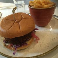 Eggplant burger with fries at Bistro Tendresse in Montreal