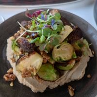 Brussel sprouts over hummus with walnuts at Bistro Tendresse in Montreal