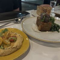 From left to right: smoked paprika hummus, pavé entree, and focaccia  at Bistro Tendresse in Montreal