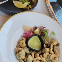 "Calamari" (bottom) and brussel sprouts (top) at Bistro Tendresse in Montreal