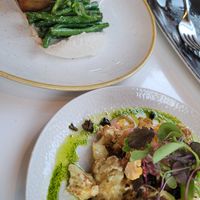 Cauliflower bites (bottom), potato mille feuille (top) at Bistro Tendresse in Montreal